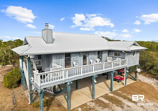 Photo 1 of Single family home for sale at 8877 Dolphin Ln, Gulf Shores, AL 36542 | MLS# 394547 | Listing updated on 2026-09-04