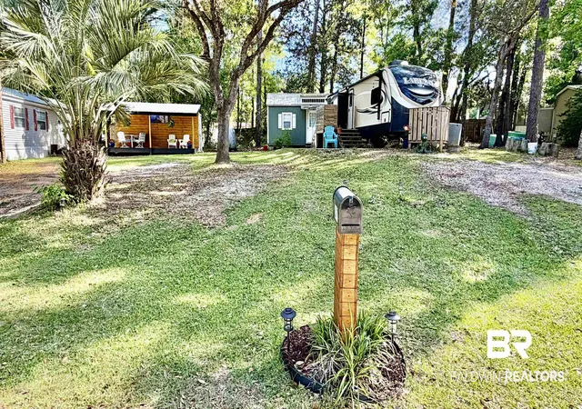 1st image of 597 Buena Vista Dr, Lillian, AL 36549 | MLS# 395259