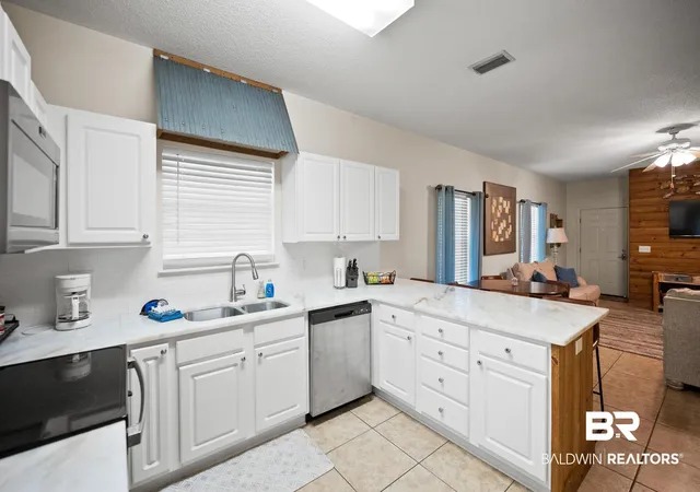 Photo 3 of Townhouse for sale at 4375 Lindsey Ln #B, Orange Beach, AL 36561 | MLS# 392423 | Listing updated on 2026-09-18