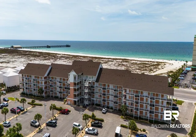 Photo 1 of Townhouse for sale at 572 E Beach Blvd #207, Gulf Shores, AL 36542 | MLS# 396174 | Listing updated on 2026-09-21