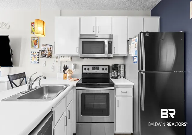 Photo 4 of Townhouse for sale at 572 E Beach Blvd #207, Gulf Shores, AL 36542 | MLS# 396174 | Listing updated on 2026-09-21