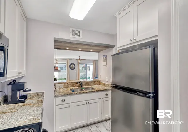 Photo 3 of Townhouse for sale at 328 Clubhouse Dr #1-C, Gulf Shores, AL 36542 | MLS# 392804 | Listing updated on 2026-08-13