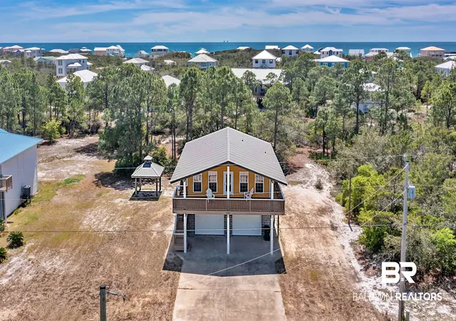 Photo 1 of Single family home for sale at 6782 Palmetto Dr, Gulf Shores, AL 36542 | MLS# 394859 | Listing updated on 2026-10-06