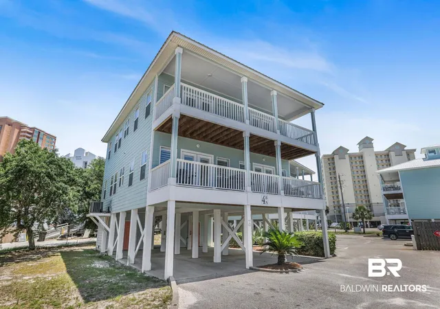 Photo 1 of Townhouse for sale at 908 W Lagoon Ave #4A, Gulf Shores, AL 36542 | MLS# 396962 | Listing updated on 2026-08-31