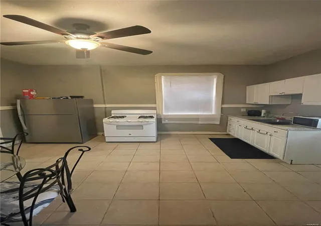 Photo 3 of Multi family home for sale at 8606 Church Rd, Saint Louis, MO 63147 | MLS# 24021207 | Listing updated on 2025-03-17