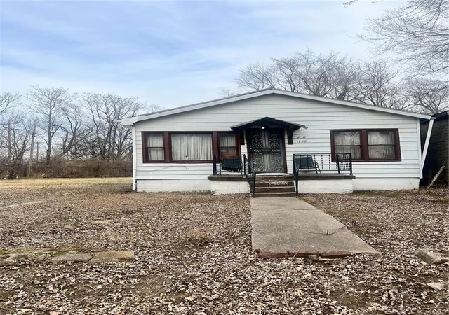 Photo 1 of Single family home for sale at 1909 Russell Ave, East Saint Louis, IL 62207 | MLS# 24063632 | Listing updated on 2024-12-06