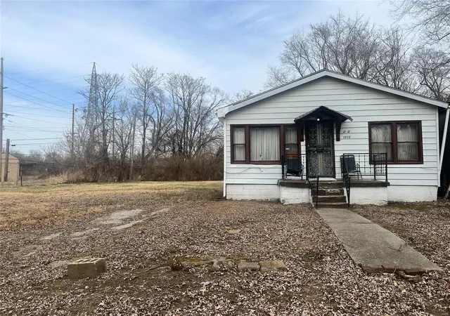 Photo 2 of Single family home for sale at 1909 Russell Ave, East Saint Louis, IL 62207 | MLS# 24063632 | Listing updated on 2024-12-06