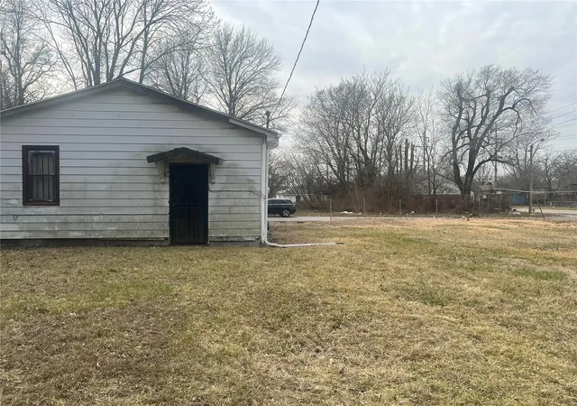 Photo 3 of Single family home for sale at 1909 Russell Ave, East Saint Louis, IL 62207 | MLS# 24063632 | Listing updated on 2024-12-06