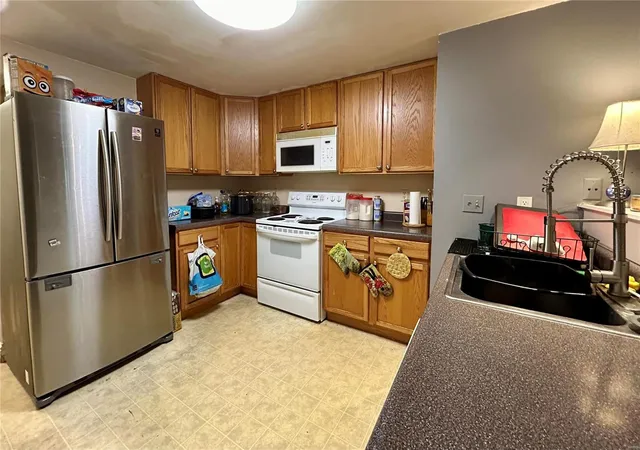 Photo 3 of Townhouse for sale at 4932 W Florissant Ave, Saint Louis, MO 63115 | MLS# 24065823 | Listing updated on 2024-10-19