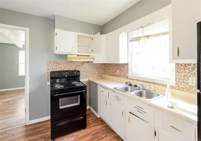 Photo 4 of Single family home for sale at 7815 Ozark Rd, Kansas City, MO 64129 | MLS# 24070358 | Listing updated on 2025-01-25