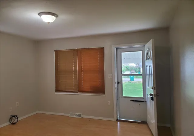 Photo 2 of Single family home for sale at 1001 Ernst St, East Saint Louis, IL 62206 | MLS# 24073153 | Listing updated on 2024-12-07