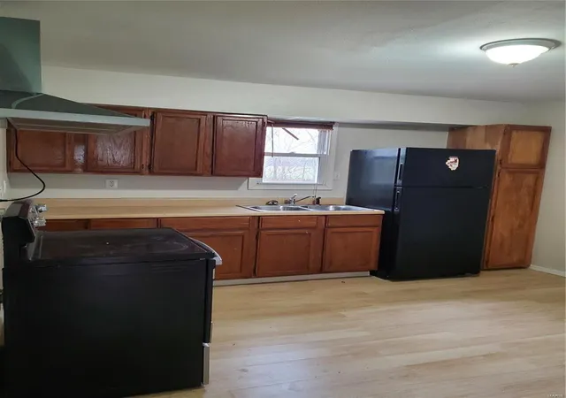 Photo 3 of Single family home for sale at 1001 Ernst St, East Saint Louis, IL 62206 | MLS# 24073153 | Listing updated on 2024-12-07