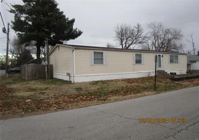 Photo 2 of Single family home for sale at 115 W 2nd St, East Saint Louis, IL 62206 | MLS# 24073897 | Listing updated on 2025-02-27