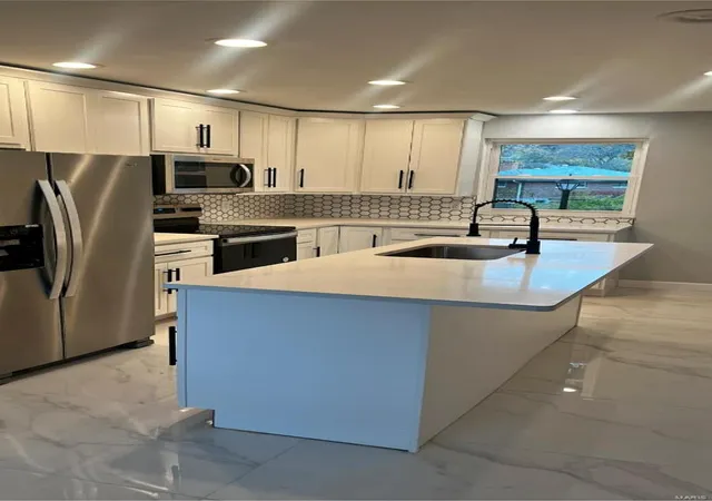 Photo 3 of Single family home for sale at 3910 Marietta Dr, Florissant, MO 63033 | MLS# 24073898 | Listing updated on 2024-12-14