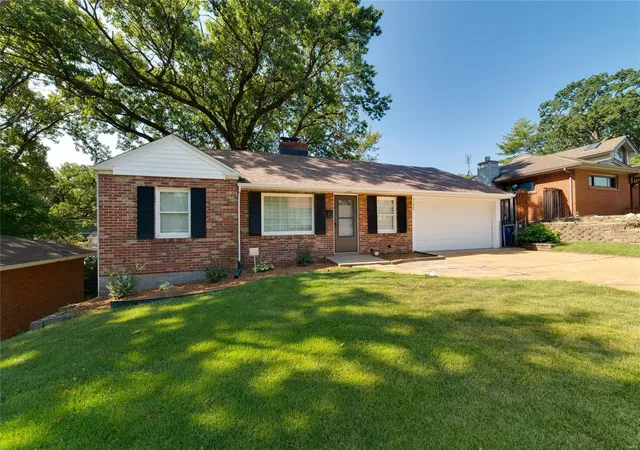 Photo 2 of Single family home for sale at 7112 Willow Wood Dr, Saint Louis, MO 63121 | MLS# 24076235 | Listing updated on 2024-12-18