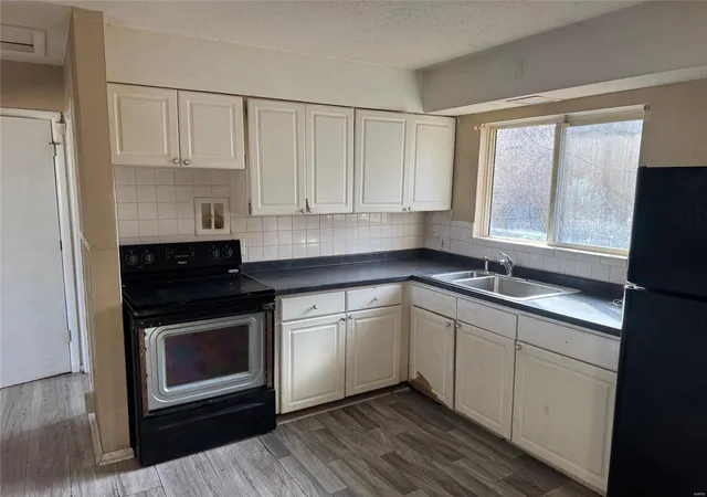Photo 3 of Single family home for sale at 11921 Homestead Ave, Saint Louis, MO 63138 | MLS# 25006252 | Listing updated on 2025-02-05