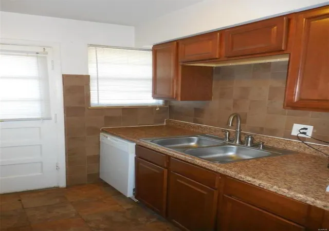 Photo 3 of Multi family home for sale at 10752 Tropic Dr #52-54, Saint Ann, MO 63074 | MLS# 25006940 | Listing updated on 2025-02-09