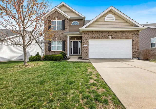Photo 1 of Single family home for sale at 74 Hidden Bluffs Dr, Lake Saint Louis, MO 63367 | MLS# 25008383 | Listing updated on 2025-04-01