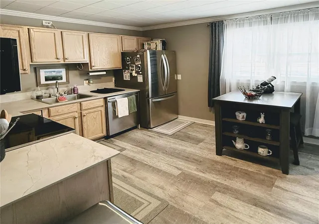 Photo 3 of Single family home for sale at 1414 Downing St, Kirksville, MO 63501 | MLS# 25009722 | Listing updated on 2025-03-09