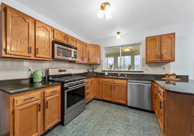 Photo 2 of Single family home for sale at 13317 East Ln, Saint Louis, MO 63128 | MLS# 25012573 | Listing updated on 2025-04-02