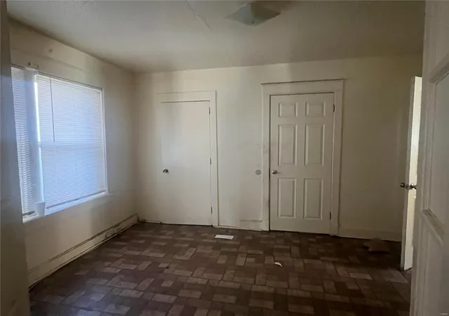 Photo 3 of Single family home for sale at 8415 N Broadway, Saint Louis, MO 63147 | MLS# 25015262 | Listing updated on 2025-03-18