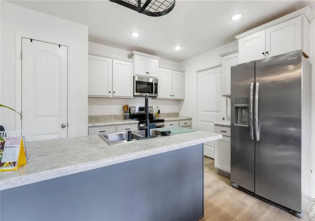 Photo 3 of Single family home for sale at 106 Quartz Ct, Saint Robert, MO 65584 | MLS# 25019239 | Listing updated on 2025-04-01
