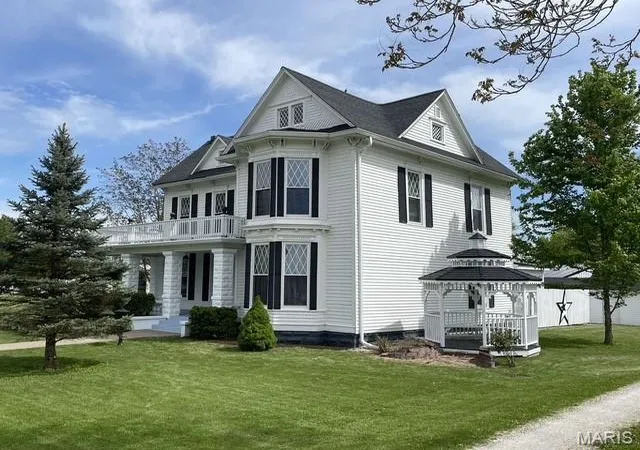 Photo 3 of Single Family Residence at 327 W Locust St, Paris, MO 65275 | MLS# MIS25057612 | | Sold on 2025-10-24