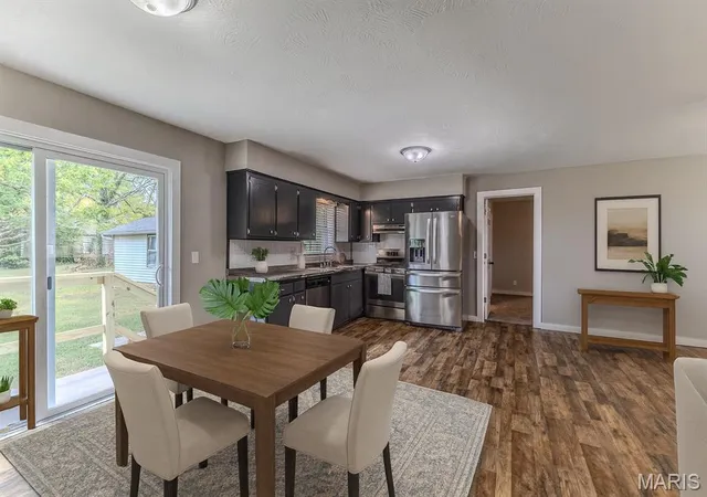 Photo 5 of Single Family Residence at 211 S Boyd St, Conway, MO 65632 | MLS# MIS25058995 | | Sold on 2025-11-18