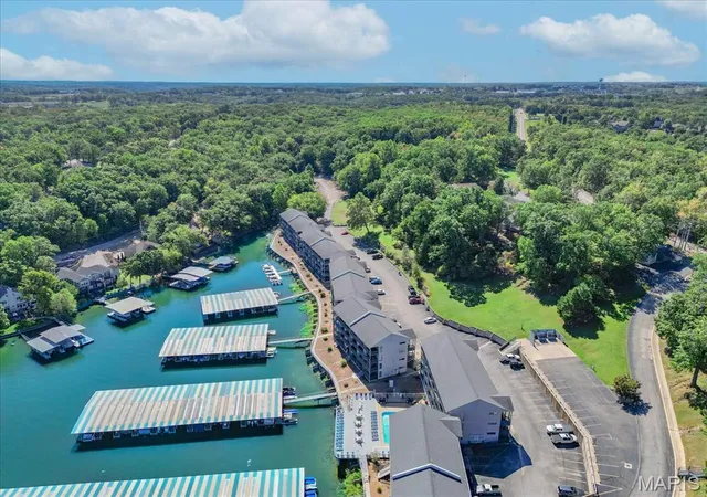 Photo 5 of Condominium at 5655 Heron Bay Dr #E404-405, Osage Beach, MO 65065 | MLS# MIS25060657 | | Sold on 2025-11-07