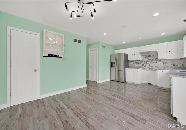 Photo 3 of Single Family Residence at 11074 Kohrs Ln, Saint Louis, MO 63123 | MLS# MIS25061666 |  | Sold on 2026-03-17