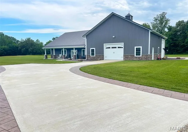 Photo 1 of Single Family Residence at 18428 Lake Circle Dr, Dexter, MO 63841 | MLS# MIS25074811 |  | Sold on 2025-12-15
