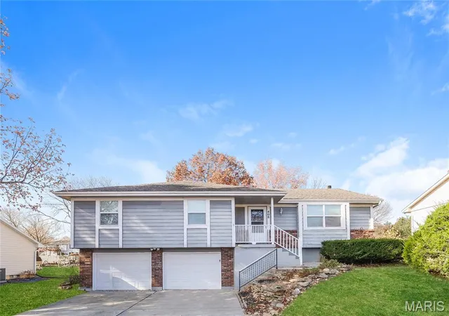 1st image of 408 N Washington St, Raymore, MO 64083 | MLS# MIS25077800