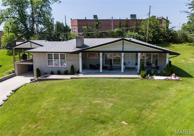 1st image of 9443 Oakwood Manor Ln, Saint Louis, MO 63126 | MLS# MIS26015348