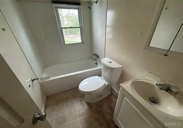 Photo 3 of Single family home for sale at 7303 Harney Ave, Saint Louis, MO 63136 | MLS# MIS26022079 | Listing updated on 2026-07-22