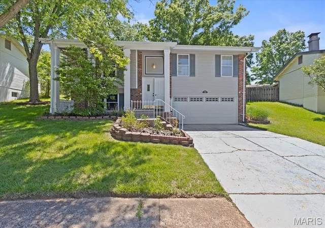 Photo 1 of Single family home for sale at 738 Village Wood Ct, Ballwin, MO 63021 | MLS# MIS26027127 | Listing updated on 2026-09-14