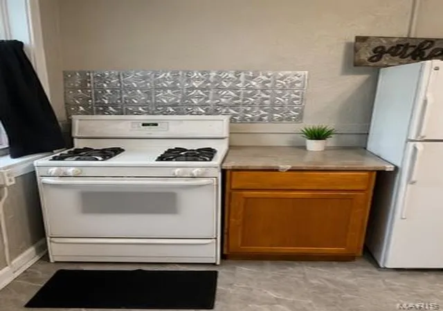 Photo 3 of Multi family home for sale at 6309 Page Ave, Saint Louis, MO 63133 | MLS# MIS26028970 | Listing updated on 2026-06-27