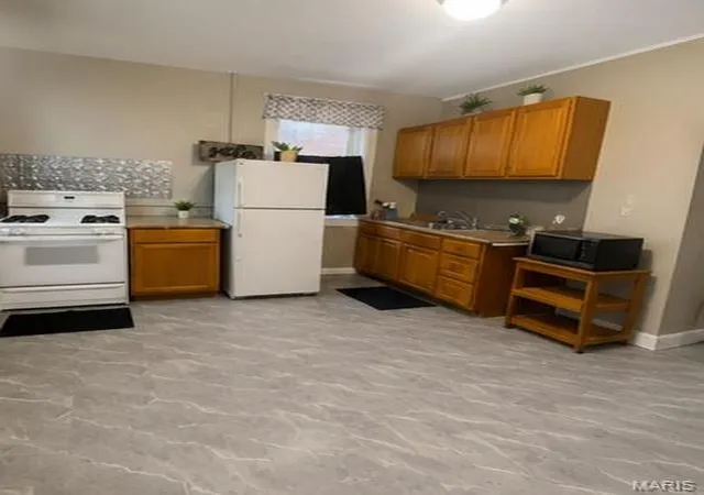 Photo 3 of Multi family home for sale at 6309 Page Ave, Saint Louis, MO 63133 | MLS# MIS26028970 | Listing updated on 2026-06-27