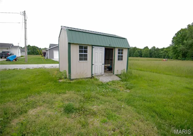 2nd image of 408 E 1st St, Ramsey, IL 62080 | MLS# MIS26031978