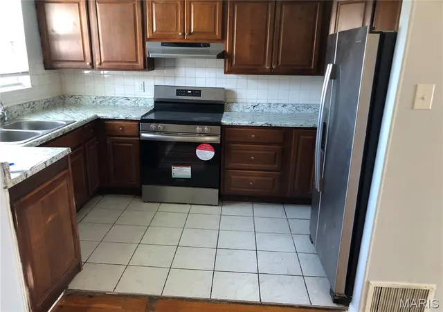 Photo 3 of Single family home for sale at 7316 Sharp Ave, Saint Louis, MO 63116 | MLS# MIS26040688 | Listing updated on 2026-09-04