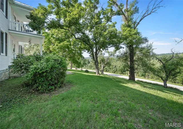 Photo 4 of Single family home for sale at 1415 Hwy F, Defiance, MO 63341 | MLS# MIS26043468 | Listing updated on 2026-10-07