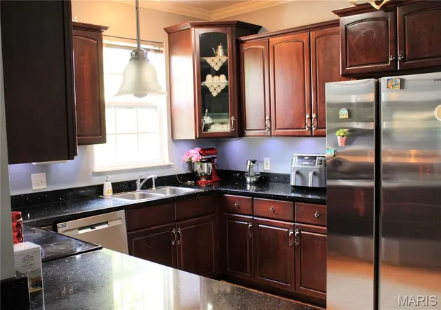 Photo 2 of Townhouse for sale at 7019 Heege Rd #A, Saint Louis, MO 63123 | MLS# MIS26045020 | Listing updated on 2026-07-20
