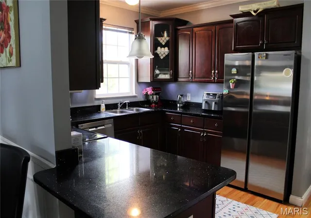 Photo 3 of Townhouse for sale at 7019 Heege Rd #A, Saint Louis, MO 63123 | MLS# MIS26045020 | Listing updated on 2026-07-20