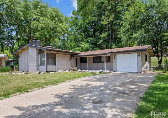 Single family home for sale at 12 Country Ln, Florissant, MO 63033 | MLS# MIS26045139