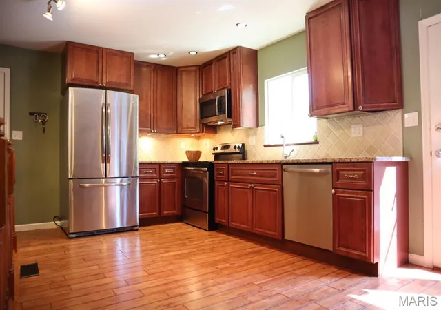 3rd image of 672 Towerwood Dr, Ballwin, MO 63021 | MLS# MIS26046553