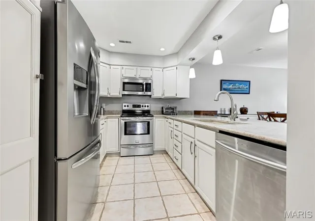 Photo 3 of Condo for sale at 1610 Lake Knoll Dr #1N, Lake Saint Louis, MO 63367 | MLS# MIS26046758 | Listing updated on 2026-10-09
