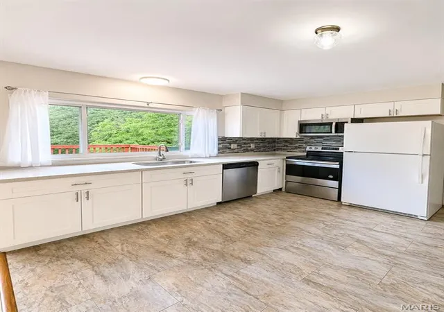 Photo 3 of Single family home for sale at 745 Woodrun Dr, Ballwin, MO 63021 | MLS# MIS26046826 | Listing updated on 2026-09-07