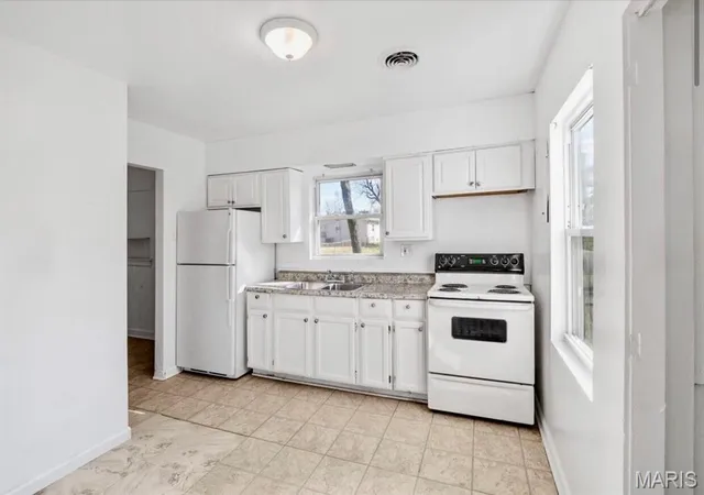 Photo 3 of Sale Pending at 1238 Maple Ave, Saint Louis, MO 63138 | MLS# MIS26046899 | Listing updated on 2026-09-25