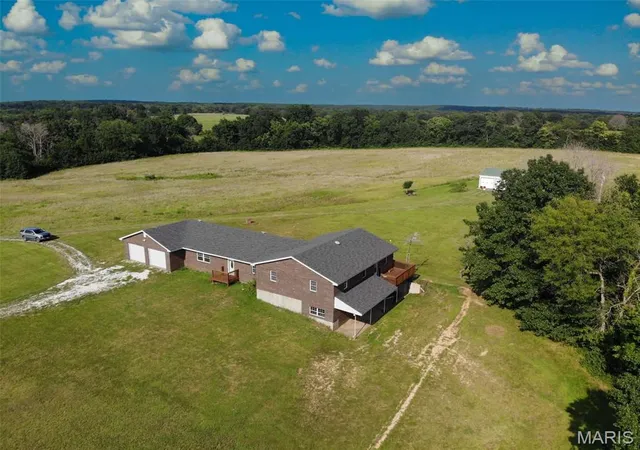 Photo 2 of Single family home for sale at 12818 Monroe Road 633, Santa Fe, MO 65282 | MLS# MIS26047778 | Listing updated on 2026-08-23
