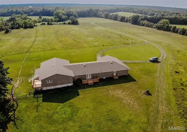 Photo 4 of Single family home for sale at 12818 Monroe Road 633, Santa Fe, MO 65282 | MLS# MIS26047778 | Listing updated on 2026-08-23