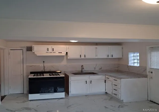 Photo 2 of Sale Pending at 8816 Cozens Ave, Saint Louis, MO 63136 | MLS# MIS26048876 | Listing updated on 2026-08-21
